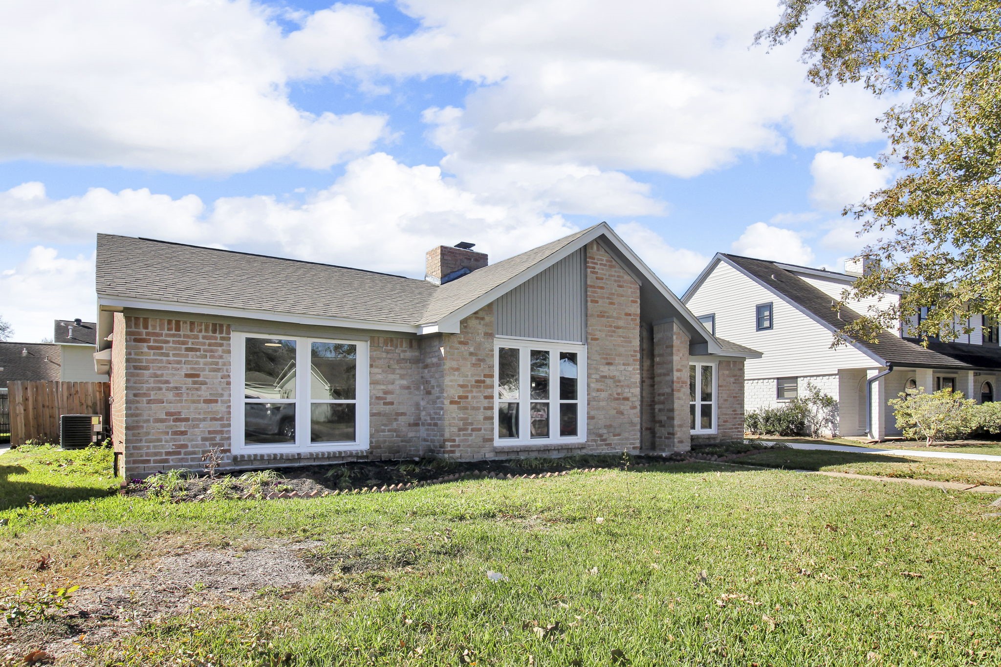 11630 Sagewillow Lane Houston, TX 77089 - Photo 2 of 25 a front view of a house with garden