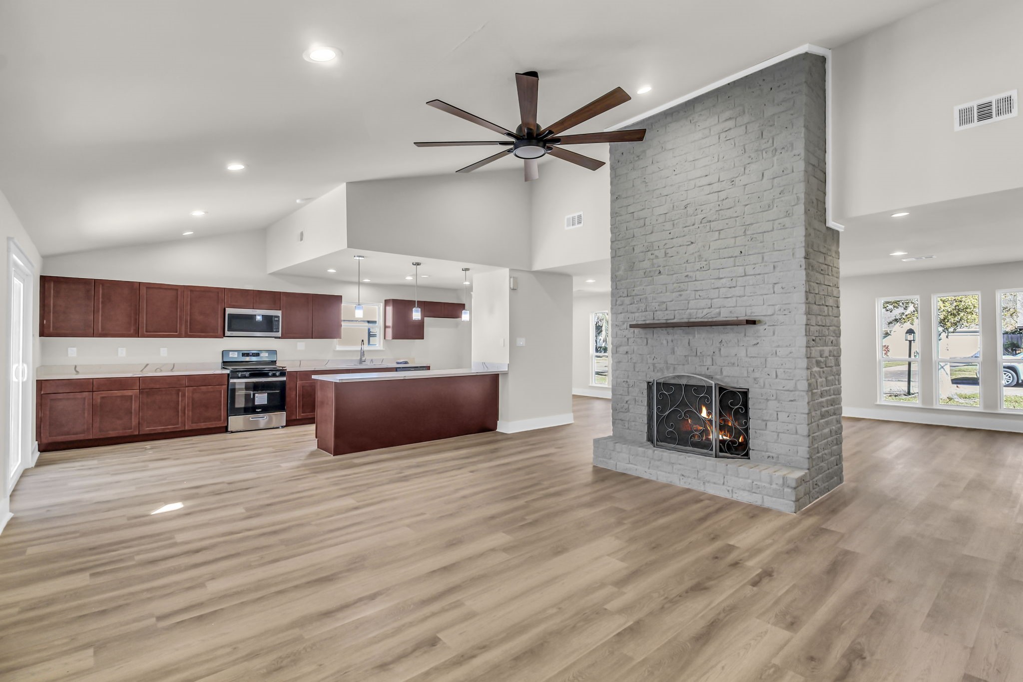 11630 Sagewillow Lane Houston, TX 77089 - Photo 3 of 25 a living room with stainless steel appliances furniture and a fireplace