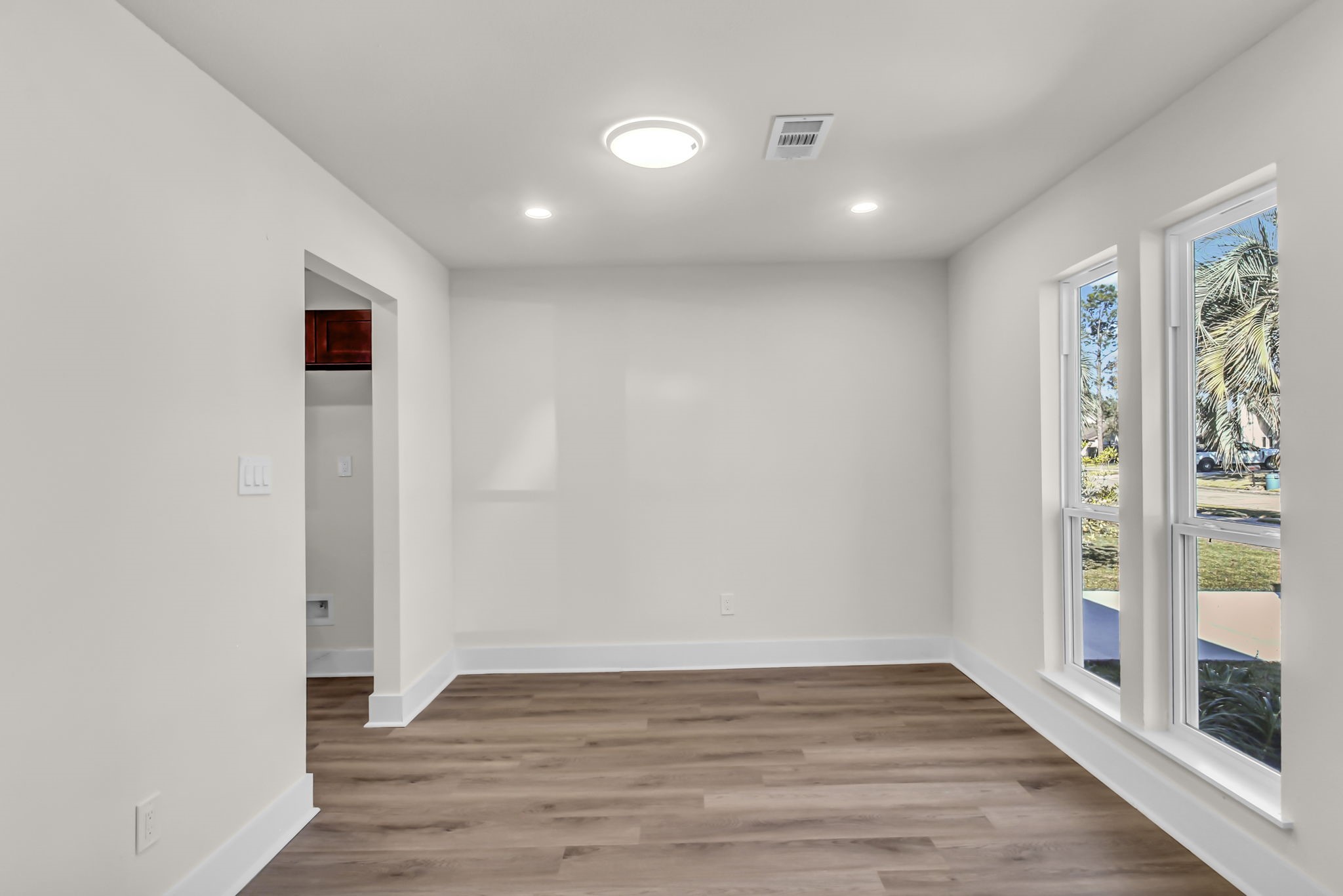 11630 Sagewillow Lane Houston, TX 77089 - Photo 8 of 25 a view of a hallway with wooden floor
