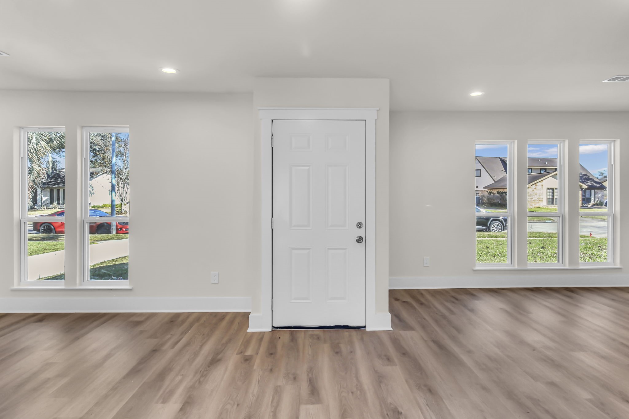 11630 Sagewillow Lane Houston, TX 77089 - Photo 9 of 25 wooden floor in an empty room with a window