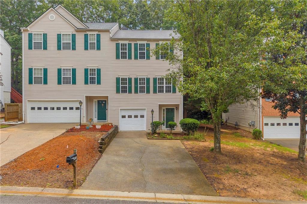 front view of a house with a street