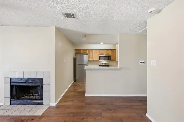 a view of kitchen and microwave