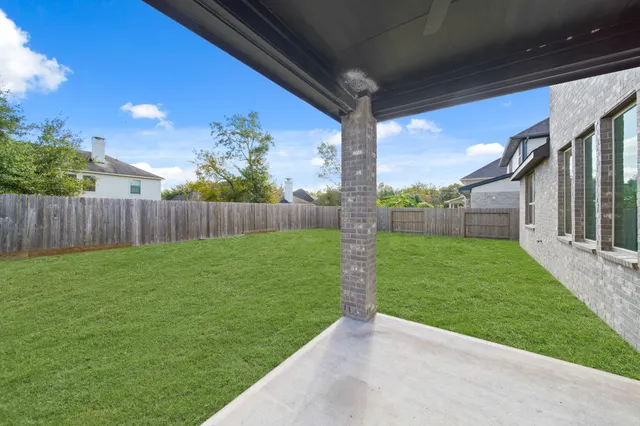 a view of a porch with a backyard