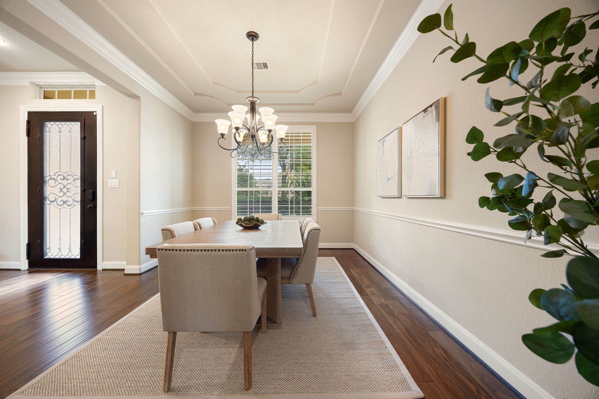 3306 Reston Landing Lane Katy, TX 77494 - Photo 7 of 50 The elegant formal dining room is connected to the kitchen making it perfect for hosting and entertaining!