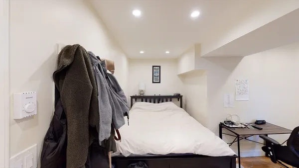 a view of a living room and workspace