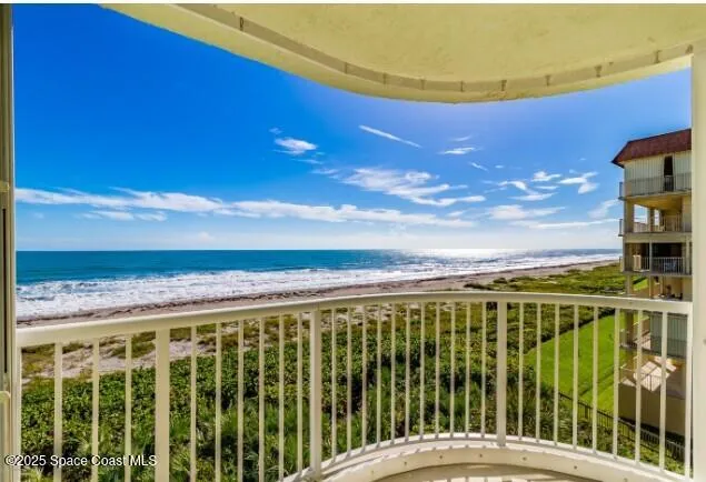 a view of a balcony with an outdoor space