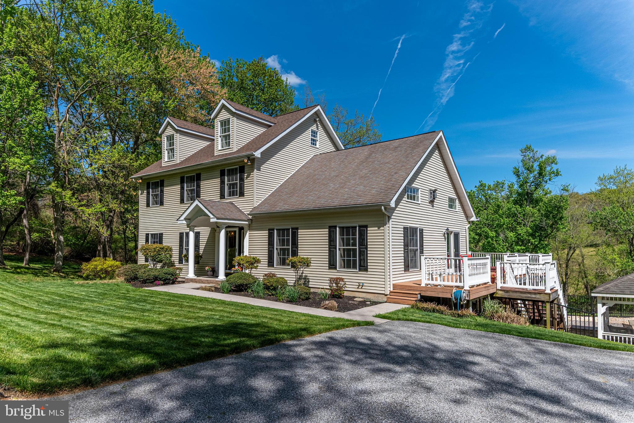 20413 Gore Mill Road Freeland, MD 21053 - Photo 1 of 35 a front view of a house with a yard