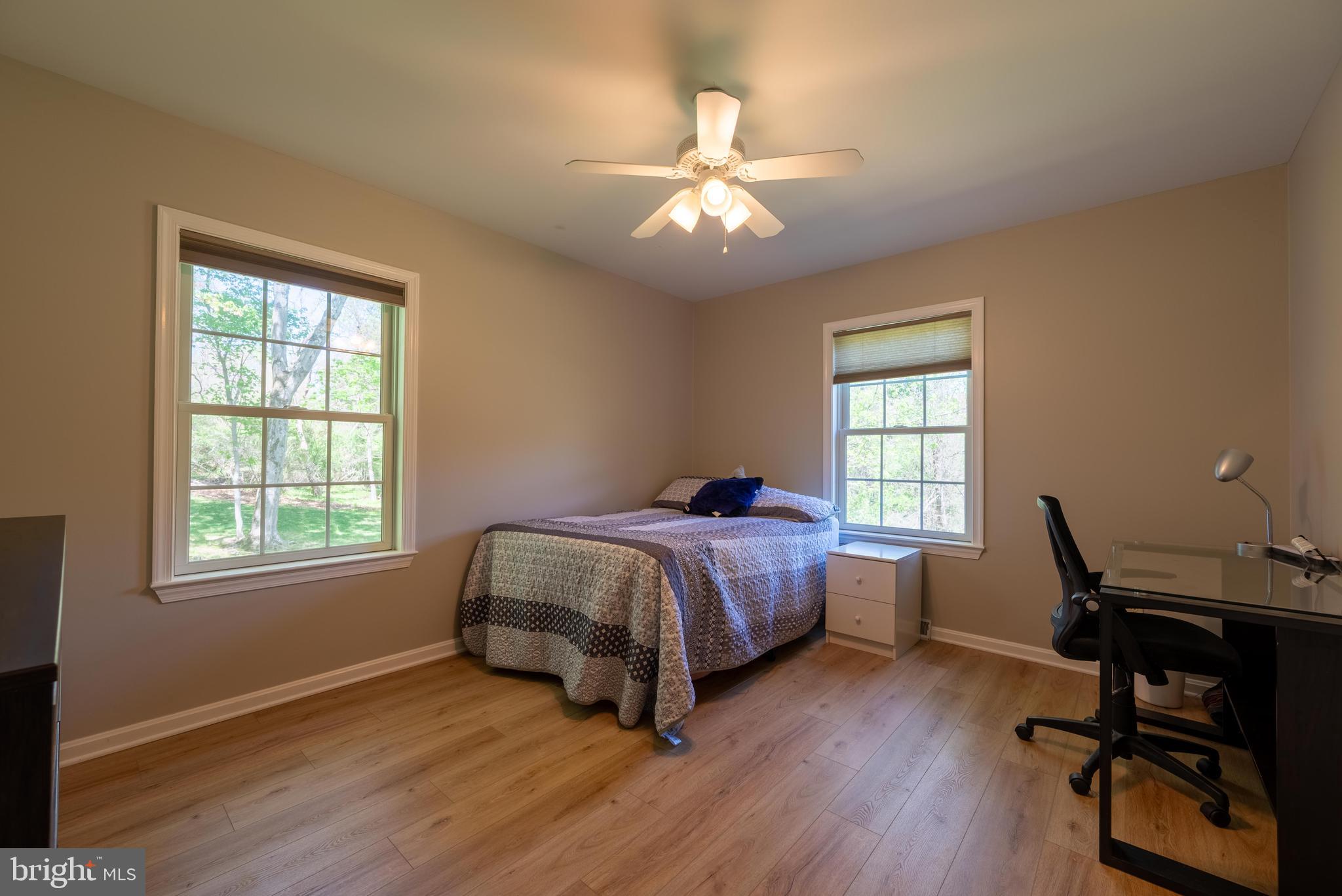 20413 Gore Mill Road Freeland, MD 21053 - Photo 12 of 35 a spacious bedroom with a bed and a window
