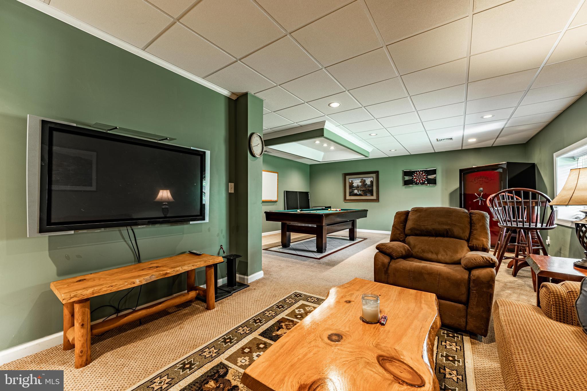 20413 Gore Mill Road Freeland, MD 21053 - Photo 16 of 35 a living room with furniture and a flat screen tv
