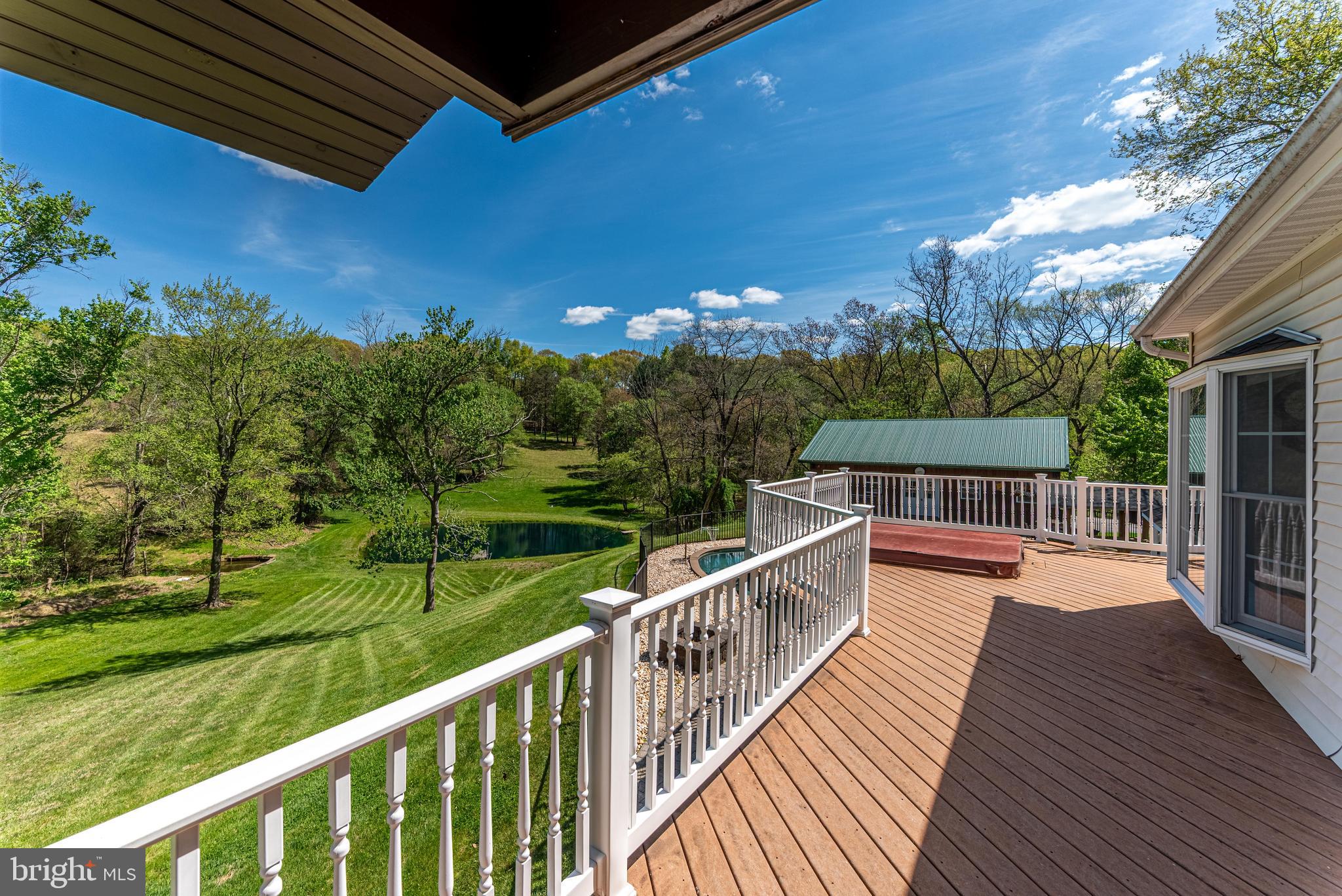 20413 Gore Mill Road Freeland, MD 21053 - Photo 20 of 35 a view of balcony with deck and trees
