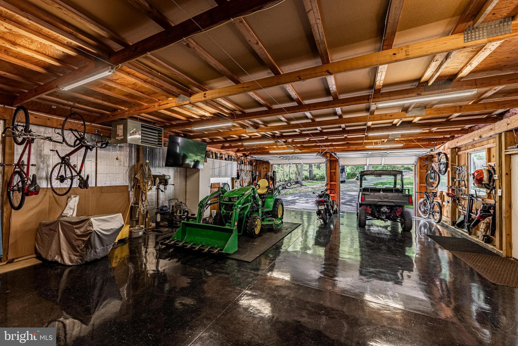 20413 Gore Mill Road Freeland, MD 21053 - Photo 29 of 35 a view of a garage with wooden table and chairs