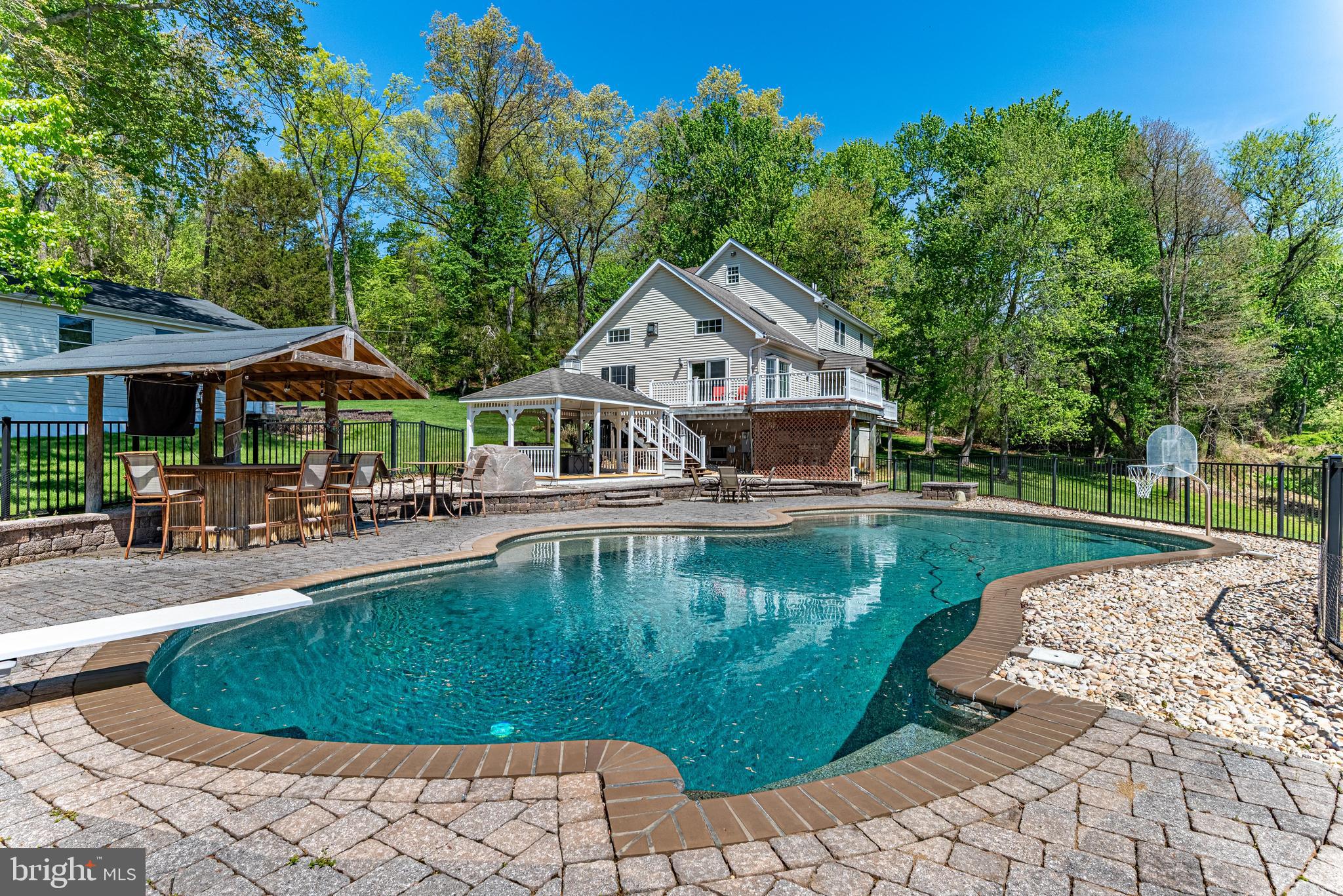 20413 Gore Mill Road Freeland, MD 21053 - Photo 35 of 35 a house with swimming pool in front of it
