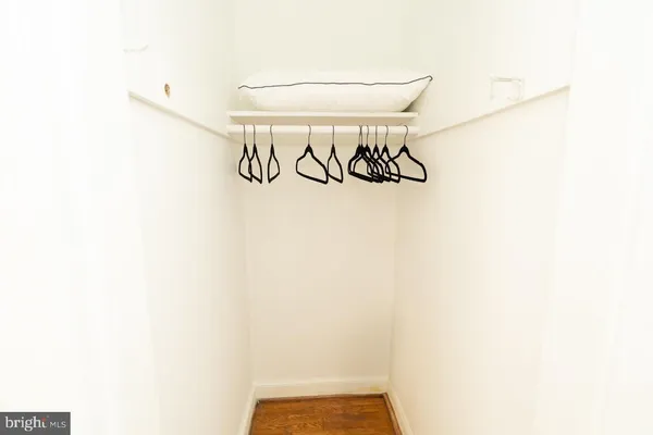 a bathroom with a sink a mirror and a shower