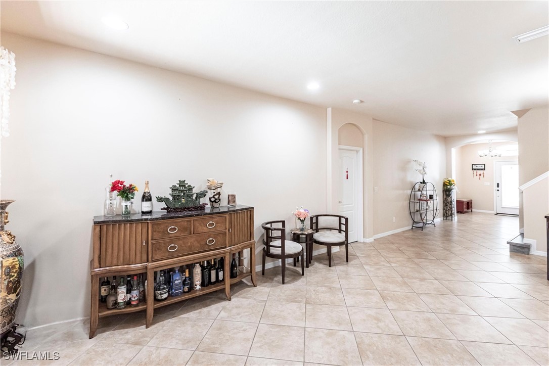 2808 Via Piazza Loop Fort Myers, FL 33905 - Photo 13 of 49 a living room with furniture and a dining table