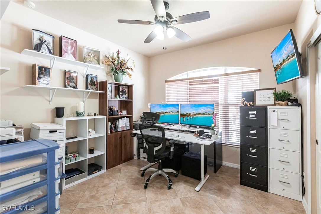 2808 Via Piazza Loop Fort Myers, FL 33905 - Photo 14 of 49 a view of a workspace with furniture and a window