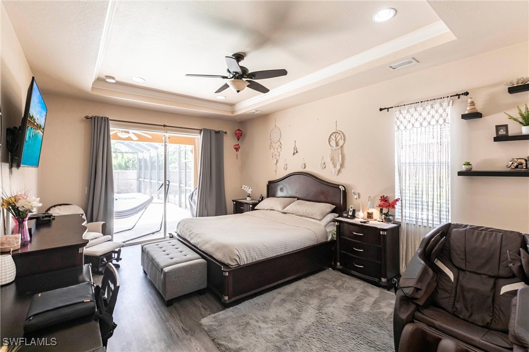 2808 Via Piazza Loop Fort Myers, FL 33905 - Photo 15 of 49 a bedroom with a bed window and couch