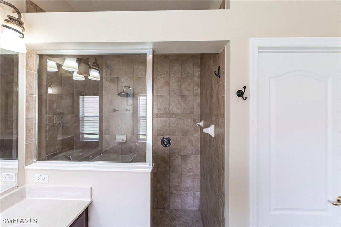 2808 Via Piazza Loop Fort Myers, FL 33905 - Photo 19 of 49 a bathroom with a shower