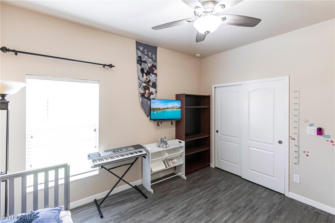 2808 Via Piazza Loop Fort Myers, FL 33905 - Photo 21 of 49 a kitchen view with wooden floor and electronic appliances