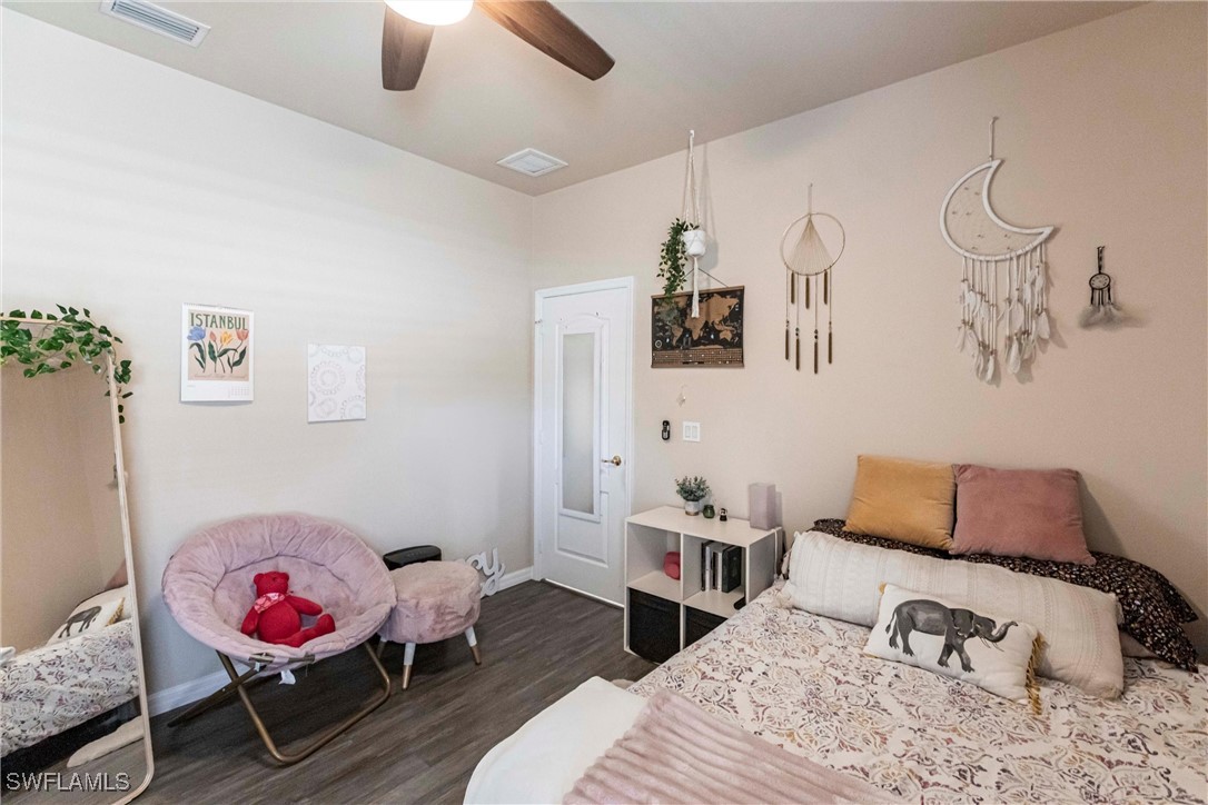 2808 Via Piazza Loop Fort Myers, FL 33905 - Photo 25 of 49 a bedroom with a bed and couch