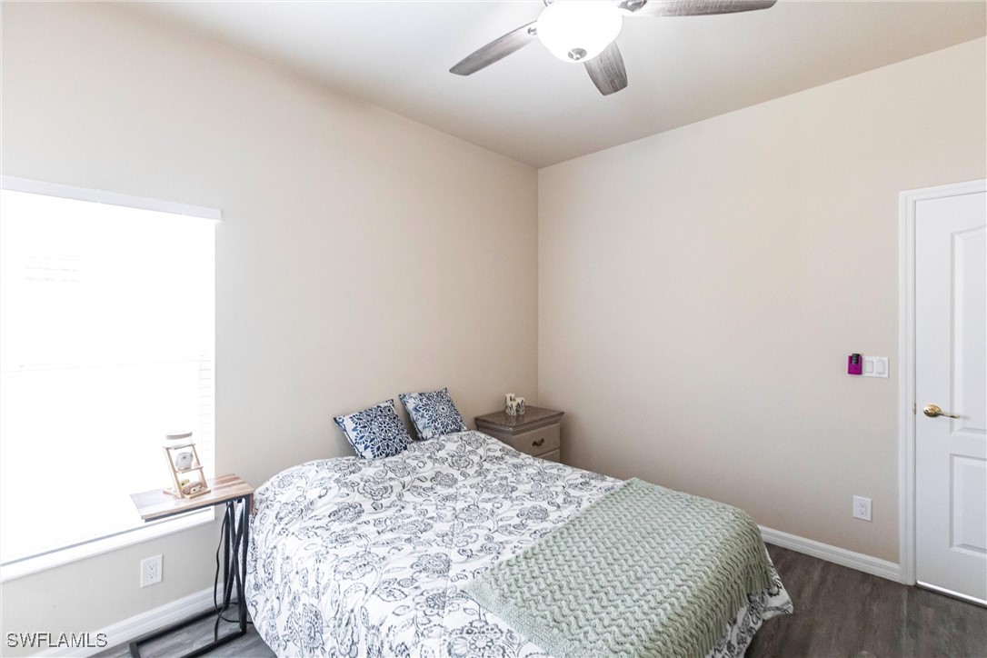 2808 Via Piazza Loop Fort Myers, FL 33905 - Photo 27 of 49 a bedroom with a bed and a window