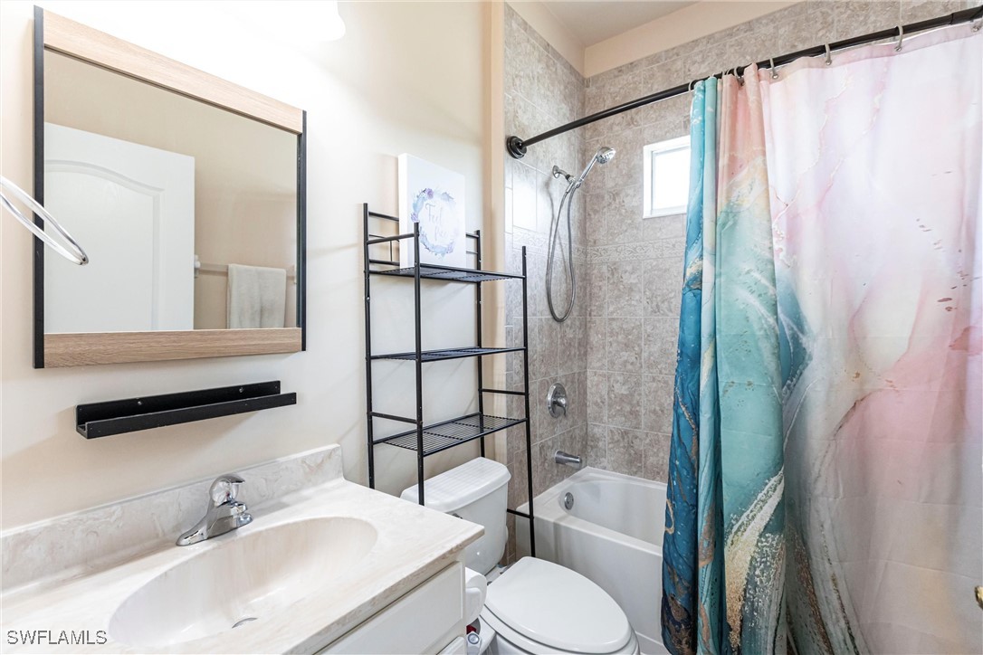 2808 Via Piazza Loop Fort Myers, FL 33905 - Photo 29 of 49 a bathroom with a sink toilet and shower