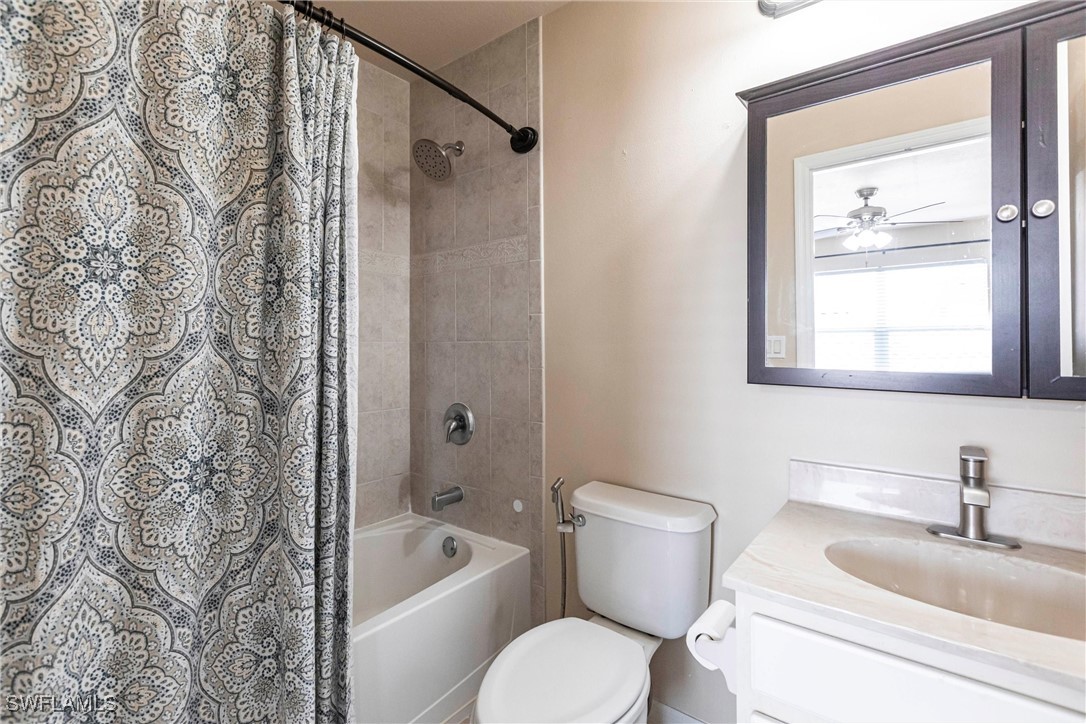 2808 Via Piazza Loop Fort Myers, FL 33905 - Photo 33 of 49 a bathroom with a sink toilet and shower