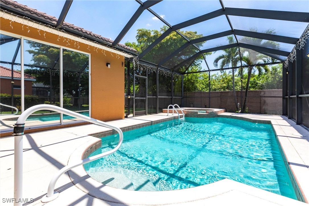 2808 Via Piazza Loop Fort Myers, FL 33905 - Photo 39 of 49 a backyard of a house with yard and outdoor seating