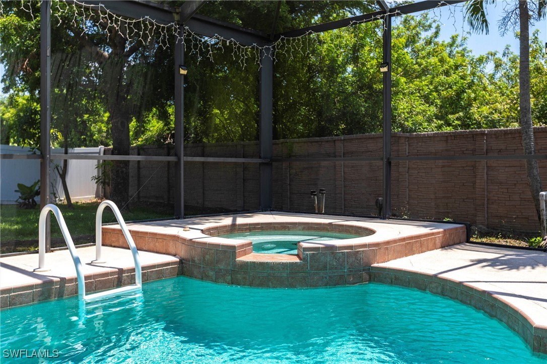 2808 Via Piazza Loop Fort Myers, FL 33905 - Photo 41 of 49 a view of a swimming pool with a patio