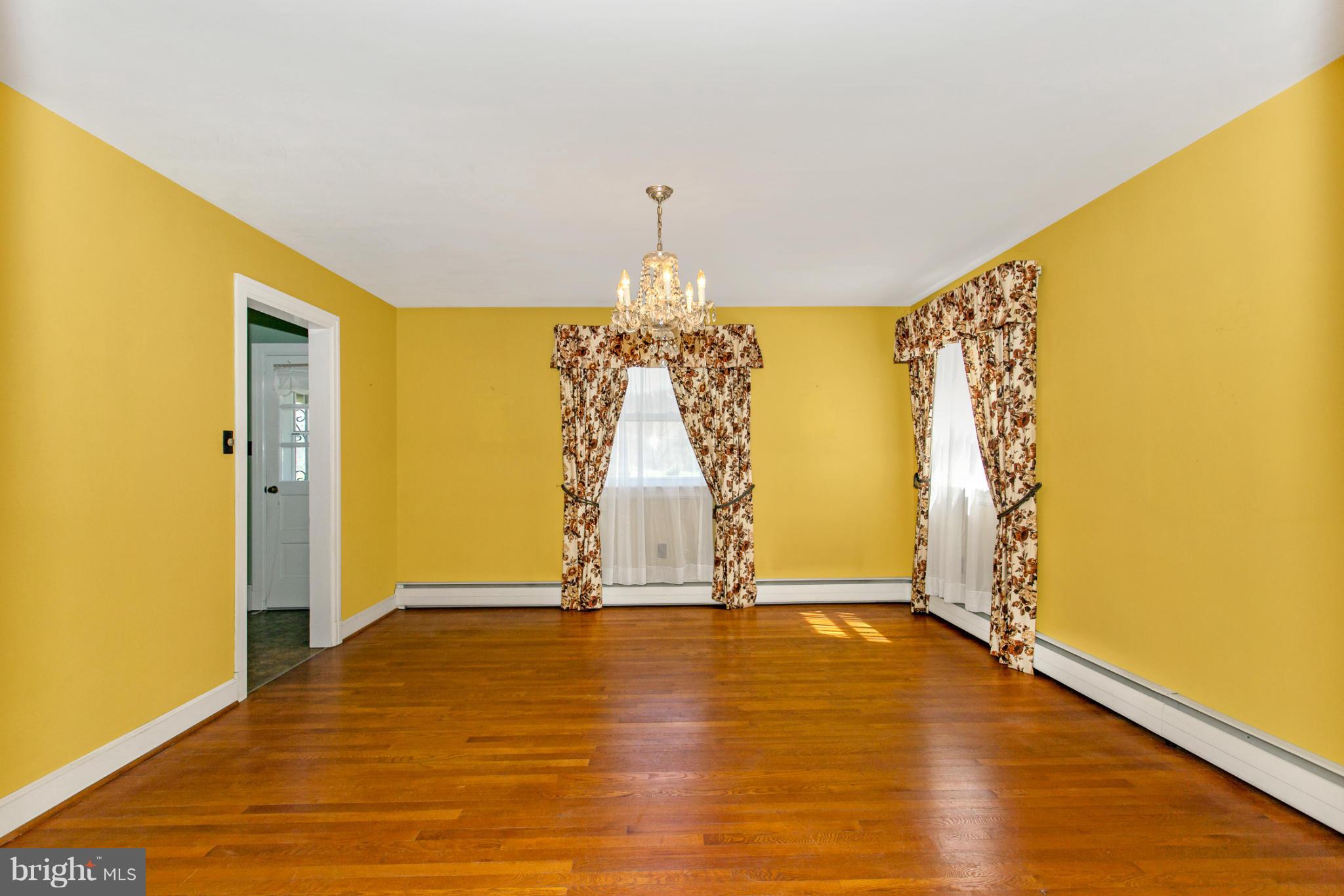 7417 Ridge Road Frederick, MD 21702 - Photo 14 of 30 a view of room with window and wooden floor