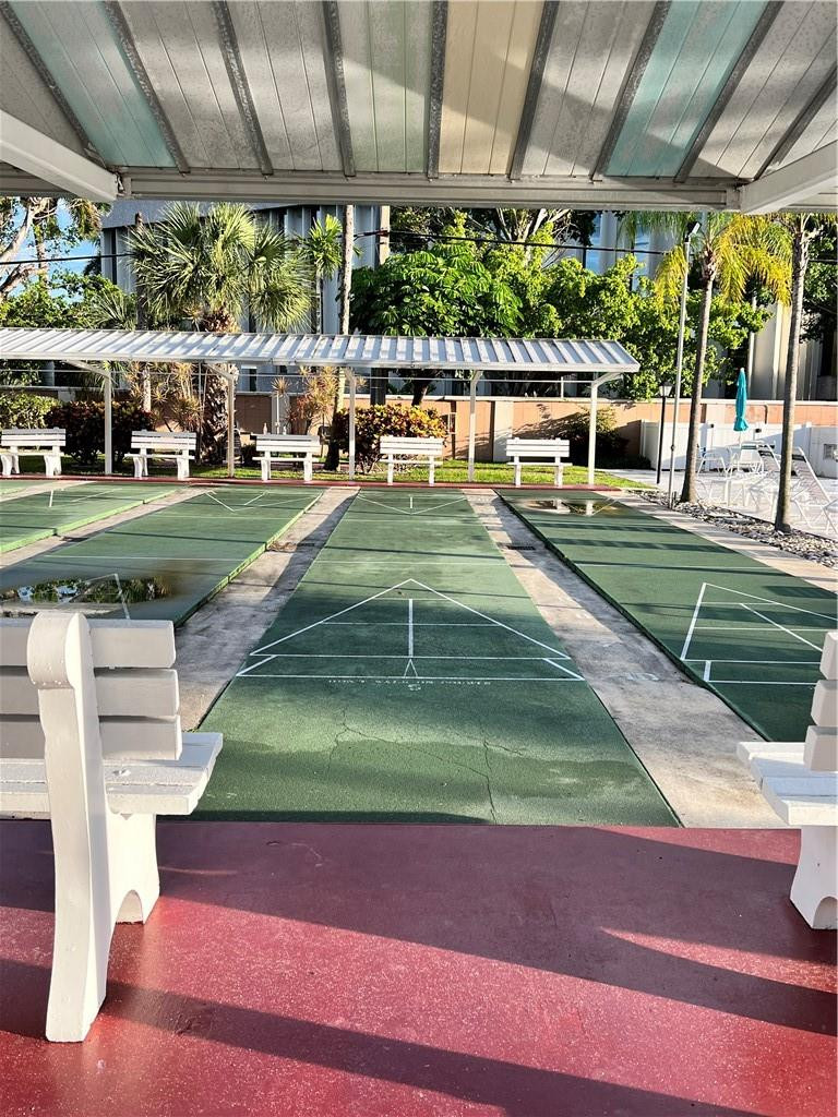 400 Northeast 20th Street, Unit B109 Boca Raton, FL 33431 - Photo 18 of 20 Shuffle Board- next to pool