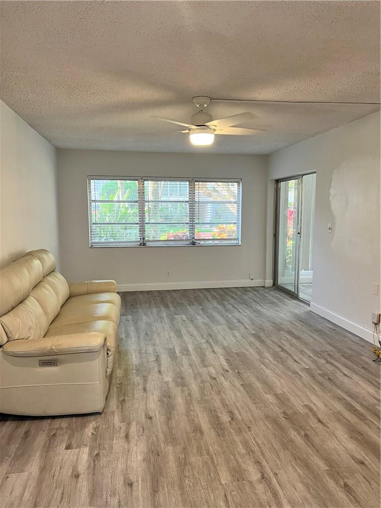 400 Northeast 20th Street, Unit B109 Boca Raton, FL 33431 - Photo 8 of 20 Grey flooring throughout