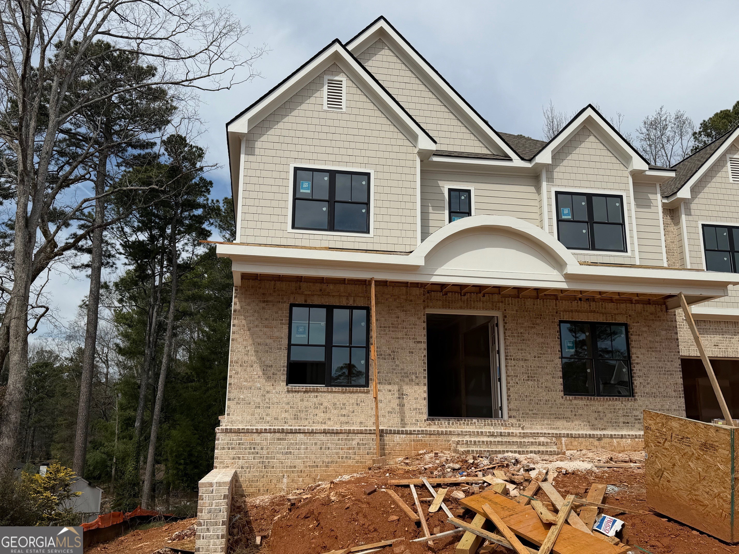 1976 Highgrove Court Atlanta, GA 30349 - Photo 11 of 48 a front view of a house with a yard