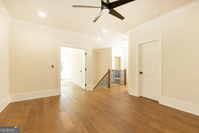 a bathroom with a double vanity sink mirror and shower