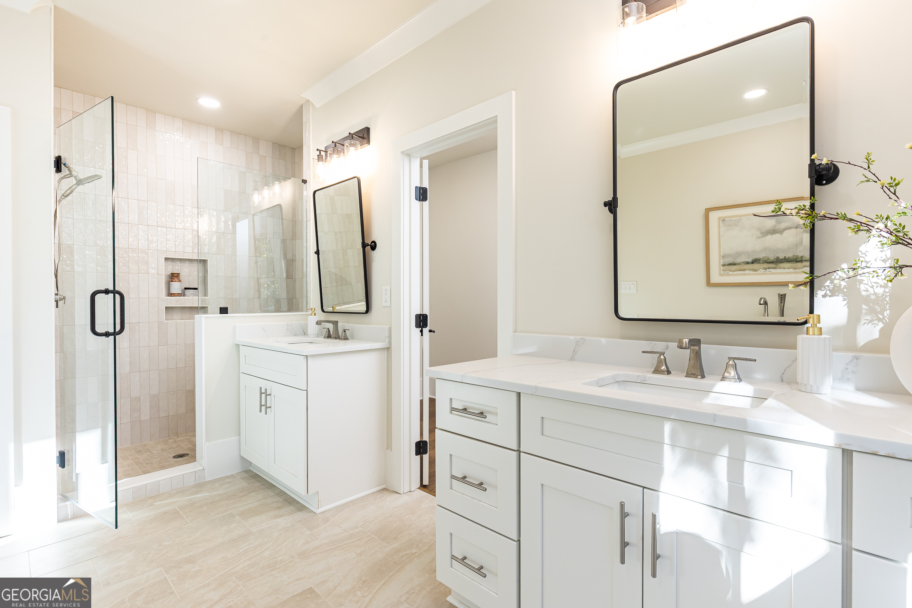 1976 Highgrove Court Atlanta, GA 30349 - Photo 37 of 48 a bathroom with a double vanity sink mirror and shower
