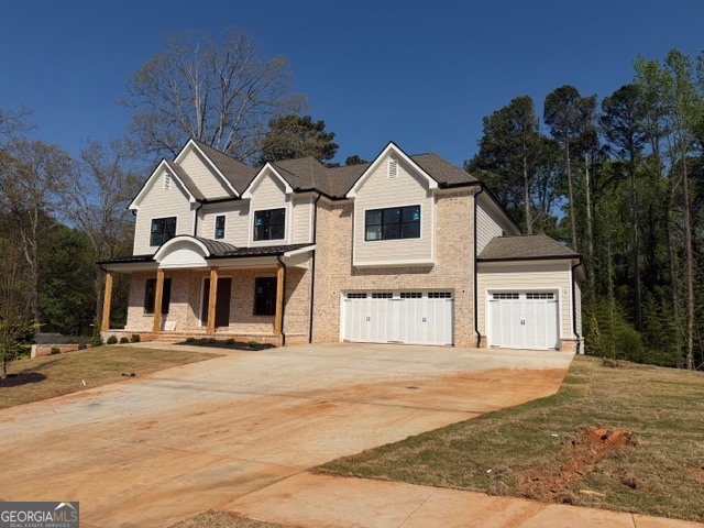 1976 Highgrove Court Atlanta, GA 30349 - Photo 8 of 48 a front view of a house with a yard
