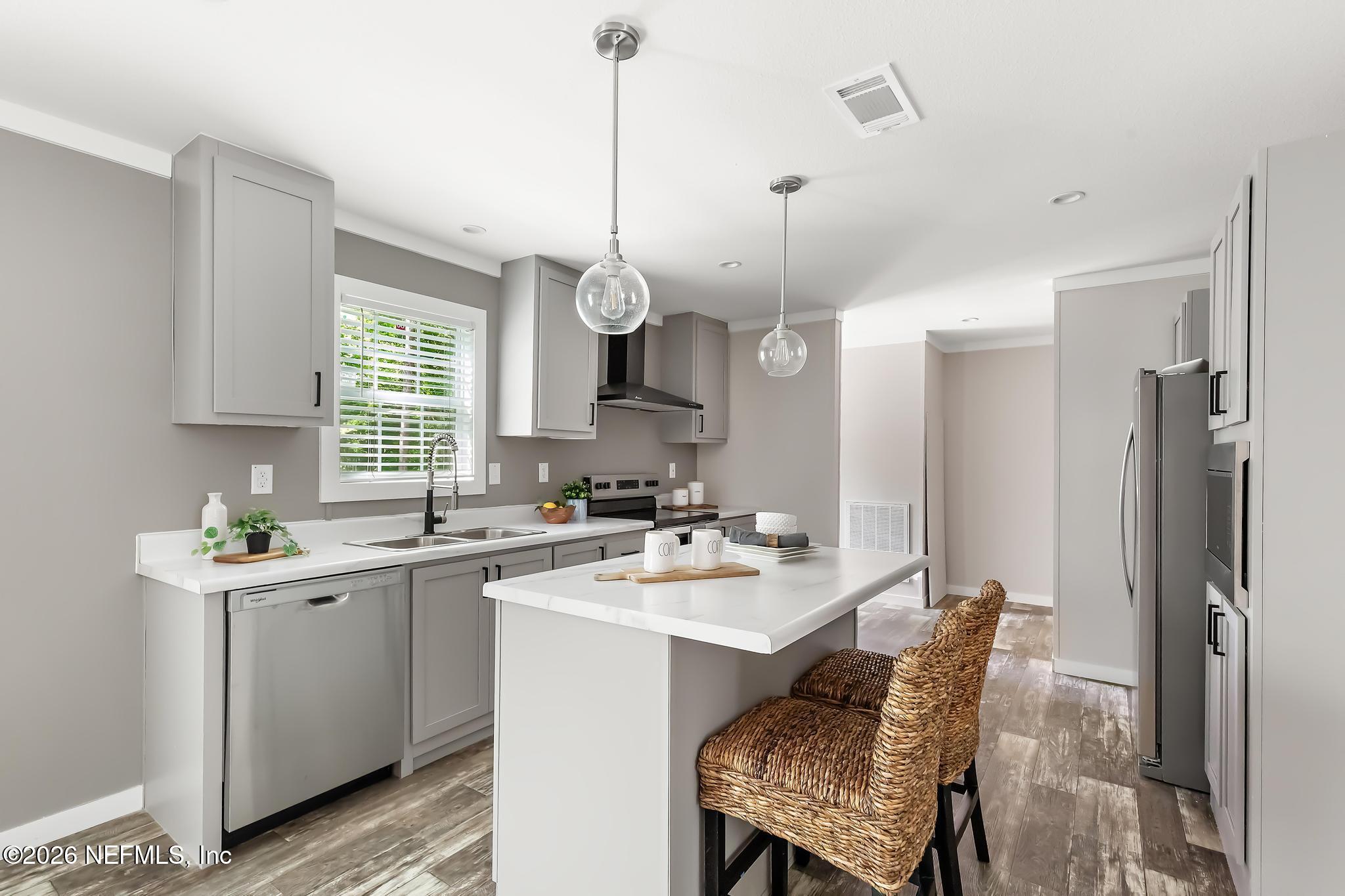 5333 Chicory Circle Middleburg, FL 32068 - Photo 21 of 53 a kitchen with a sink a counter space and appliances