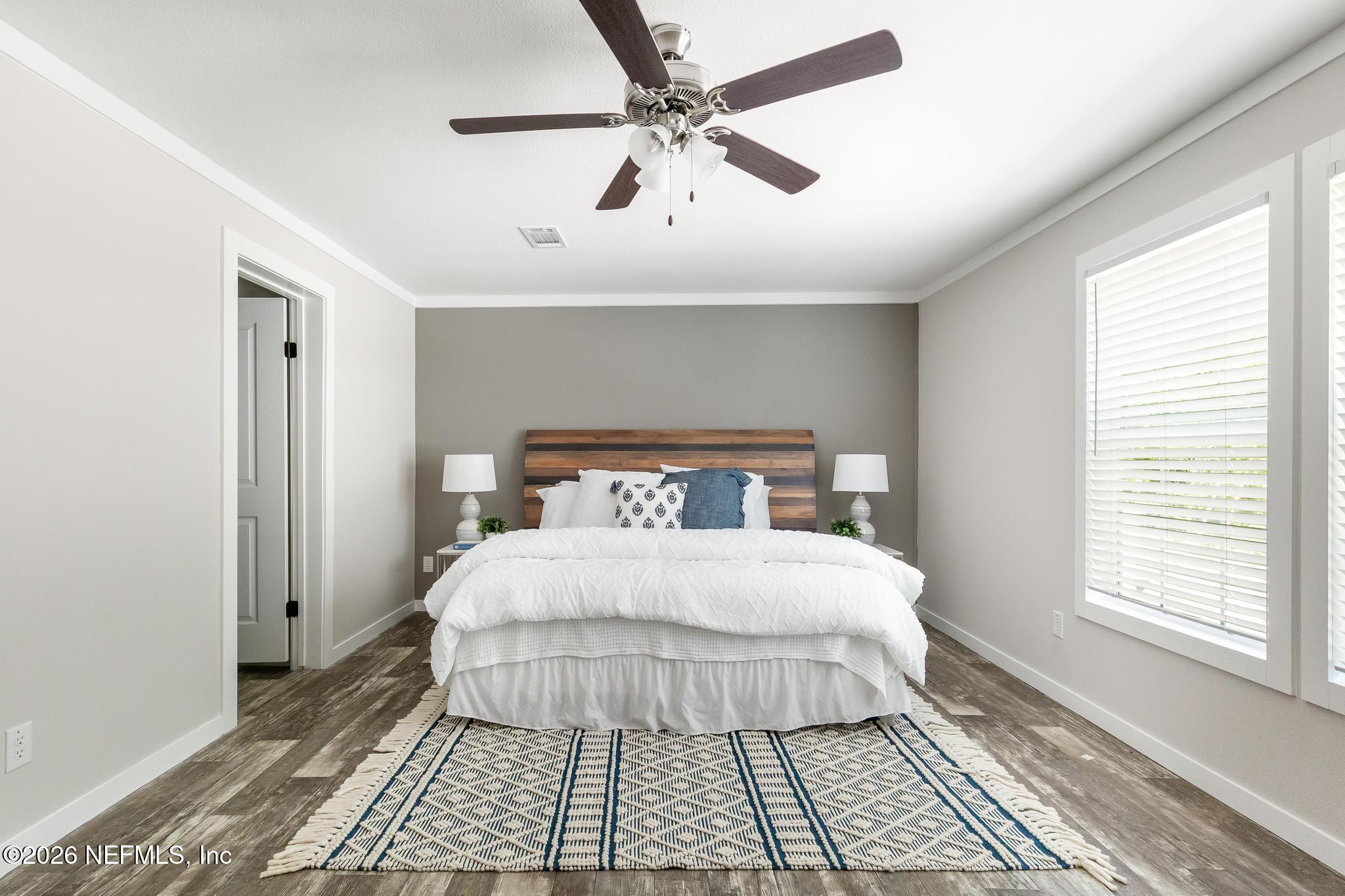 5333 Chicory Circle Middleburg, FL 32068 - Photo 40 of 53 a bedroom with a bed and a window