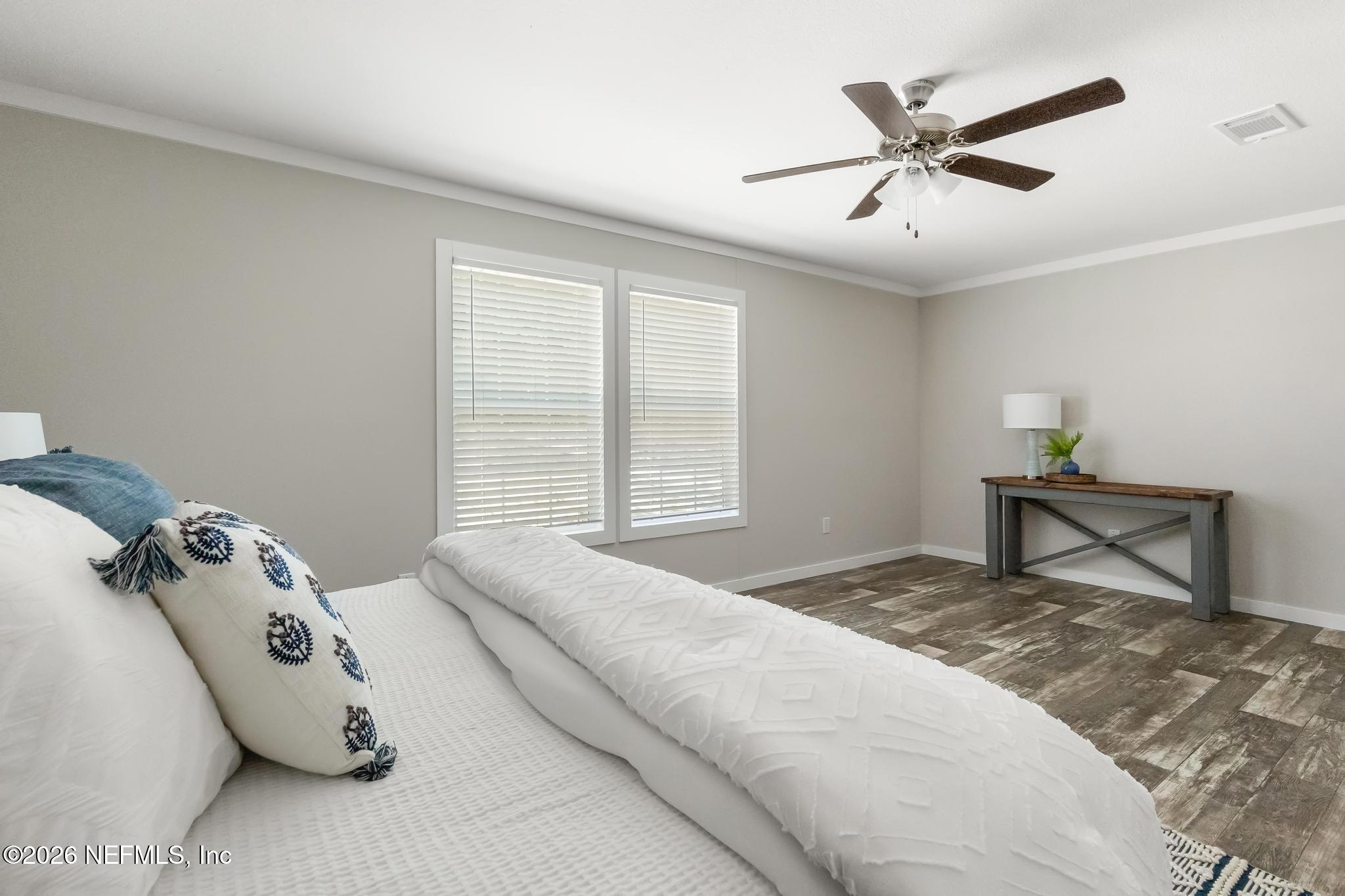 5333 Chicory Circle Middleburg, FL 32068 - Photo 42 of 53 a spacious bedroom with a bed and a window