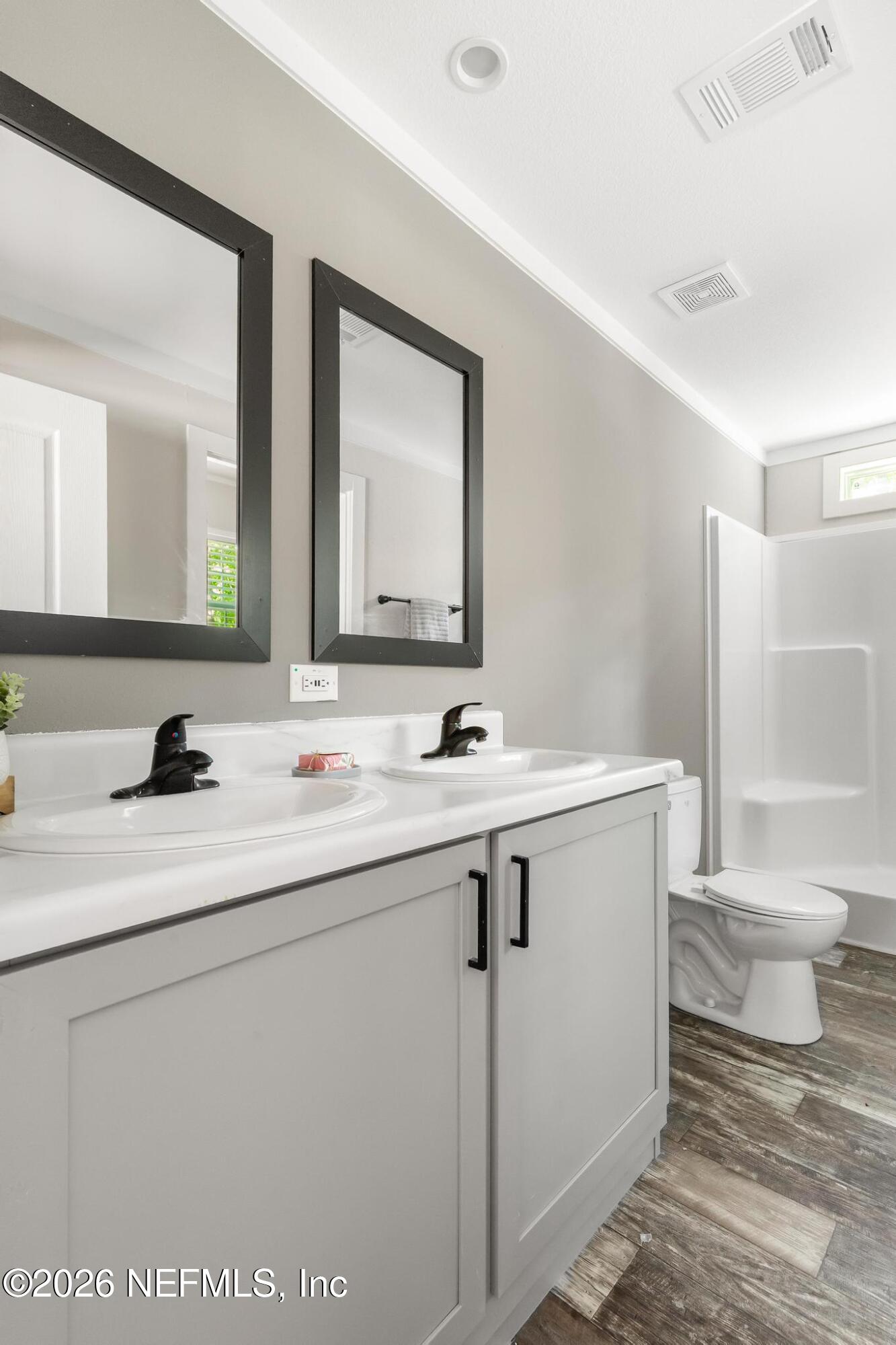 5333 Chicory Circle Middleburg, FL 32068 - Photo 44 of 53 a bathroom with a sink and a mirror