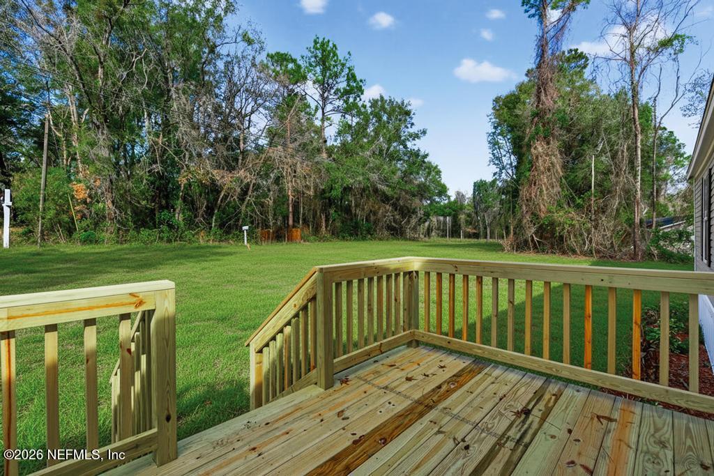 5333 Chicory Circle Middleburg, FL 32068 - Photo 48 of 53 a view of balcony with wooden floor and fence