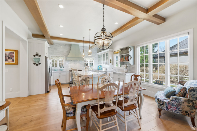 930 Price Farm Court Midway, UT 84049 - Photo 3 of 42 Dining space with quarter sawn white oak flooring, ceiling beams and RH chandelier