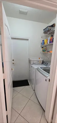 a view of a livingroom with car parked