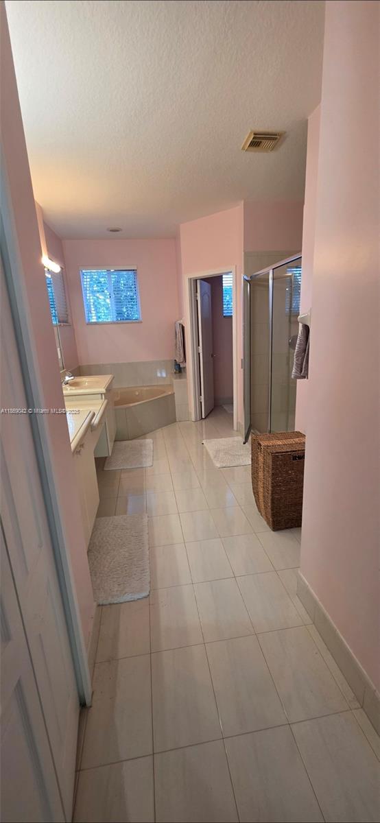 16448 Southwest 67th Terrace Miami, FL 33193 - Photo 30 of 54 a view of a hallway with seating area