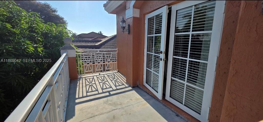 16448 Southwest 67th Terrace Miami, FL 33193 - Photo 38 of 54 a view of balcony and wooden floor
