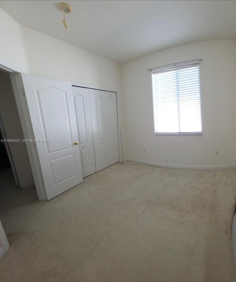 16448 Southwest 67th Terrace Miami, FL 33193 - Photo 41 of 54 an empty room with windows