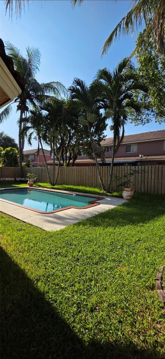 16448 Southwest 67th Terrace Miami, FL 33193 - Photo 48 of 54 a view of a garden