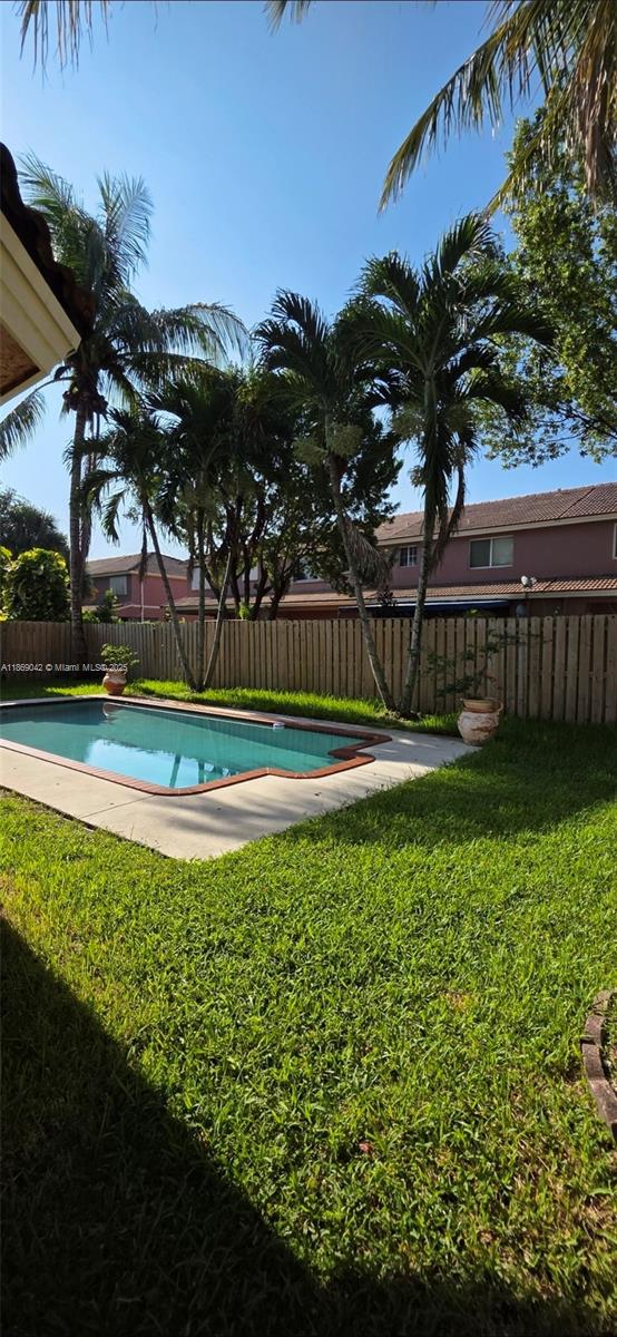 16448 Southwest 67th Terrace Miami, FL 33193 - Photo 48 of 54 a view of a garden