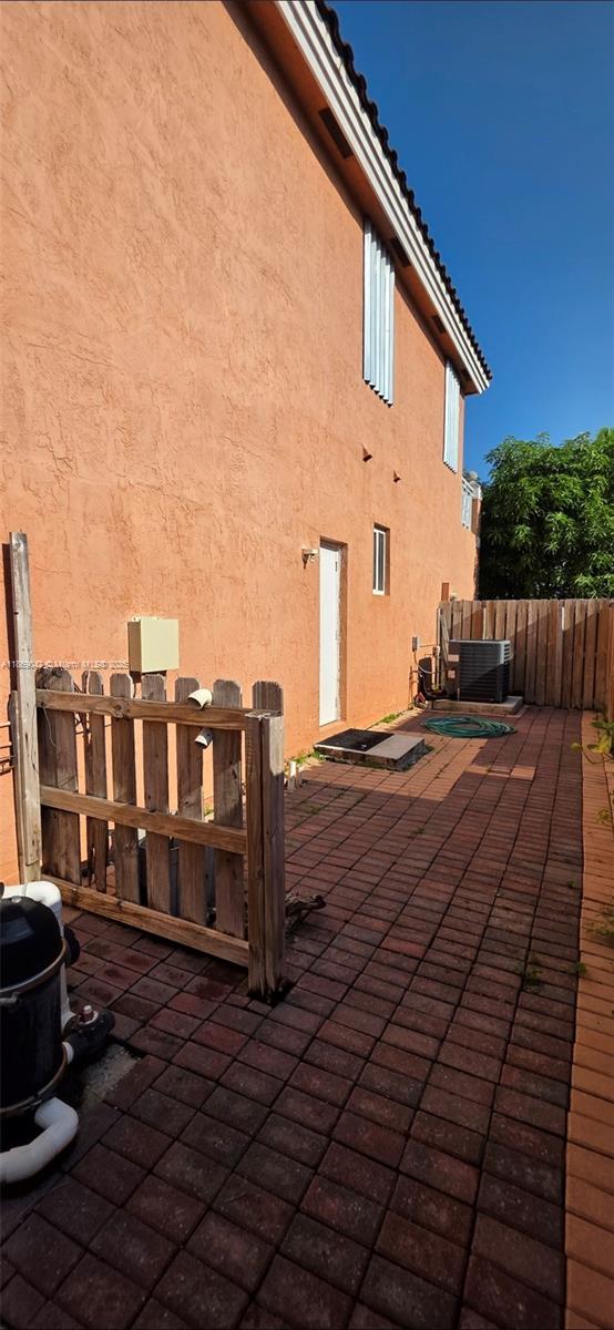 16448 Southwest 67th Terrace Miami, FL 33193 - Photo 52 of 54 a view of a house with backyard and wooden fence
