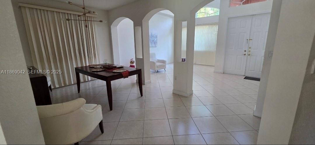 16448 Southwest 67th Terrace Miami, FL 33193 - Photo 8 of 54 a bathroom with a sink and a mirror