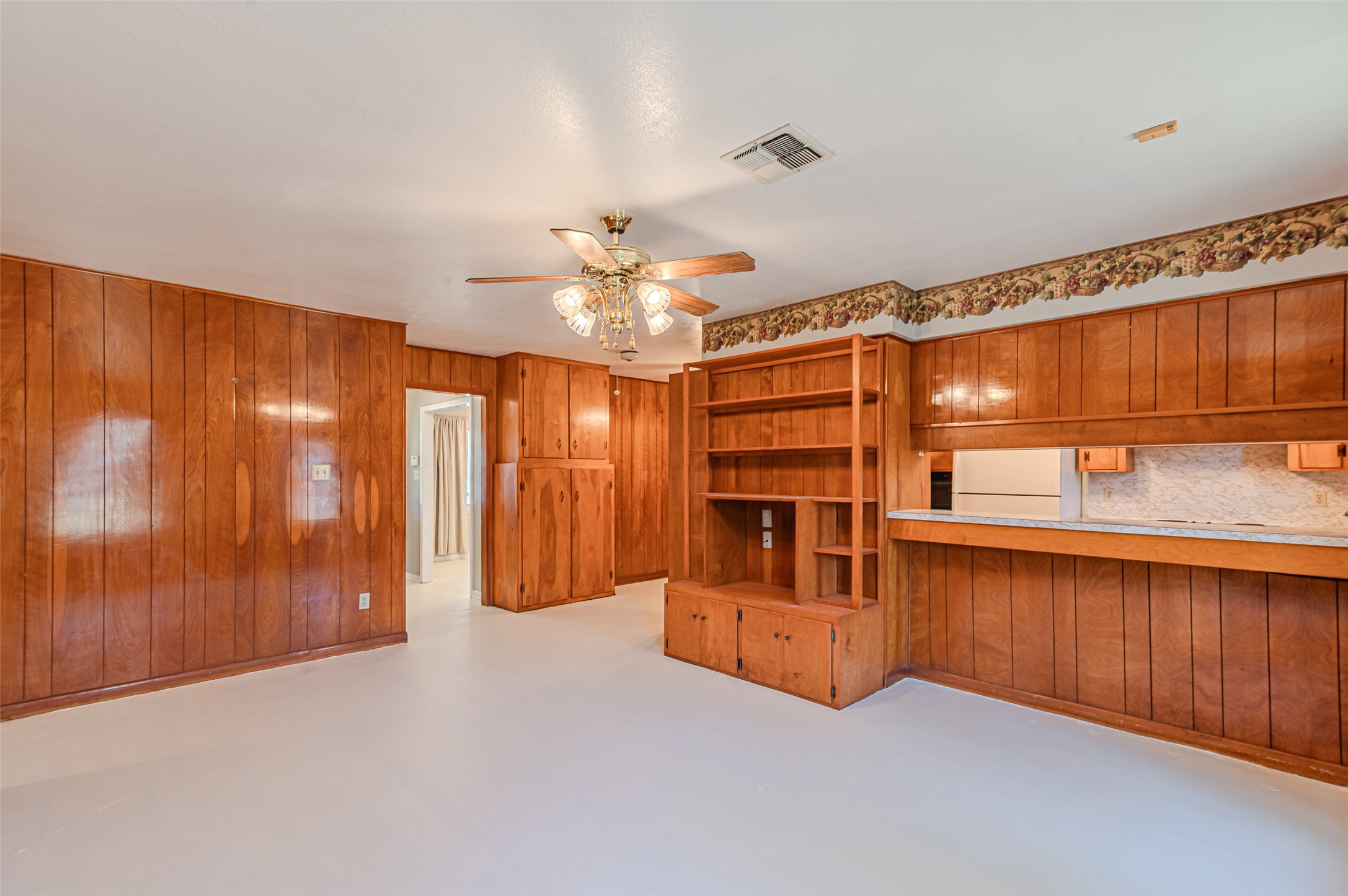1126 10th Street Hempstead, TX 77445 - Photo 18 of 34 a view of kitchen with furniture and chandelier